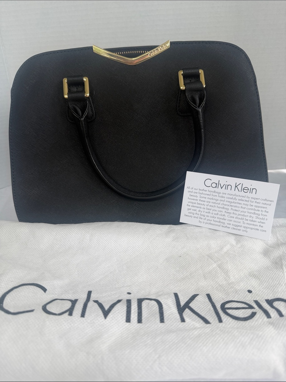 Calvin Klein Black Satchel Handbag Gold Logo and Hardware, includes dust bag